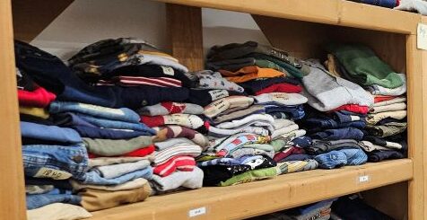 Folded clothes wooden Clothing on racks in clothes closet